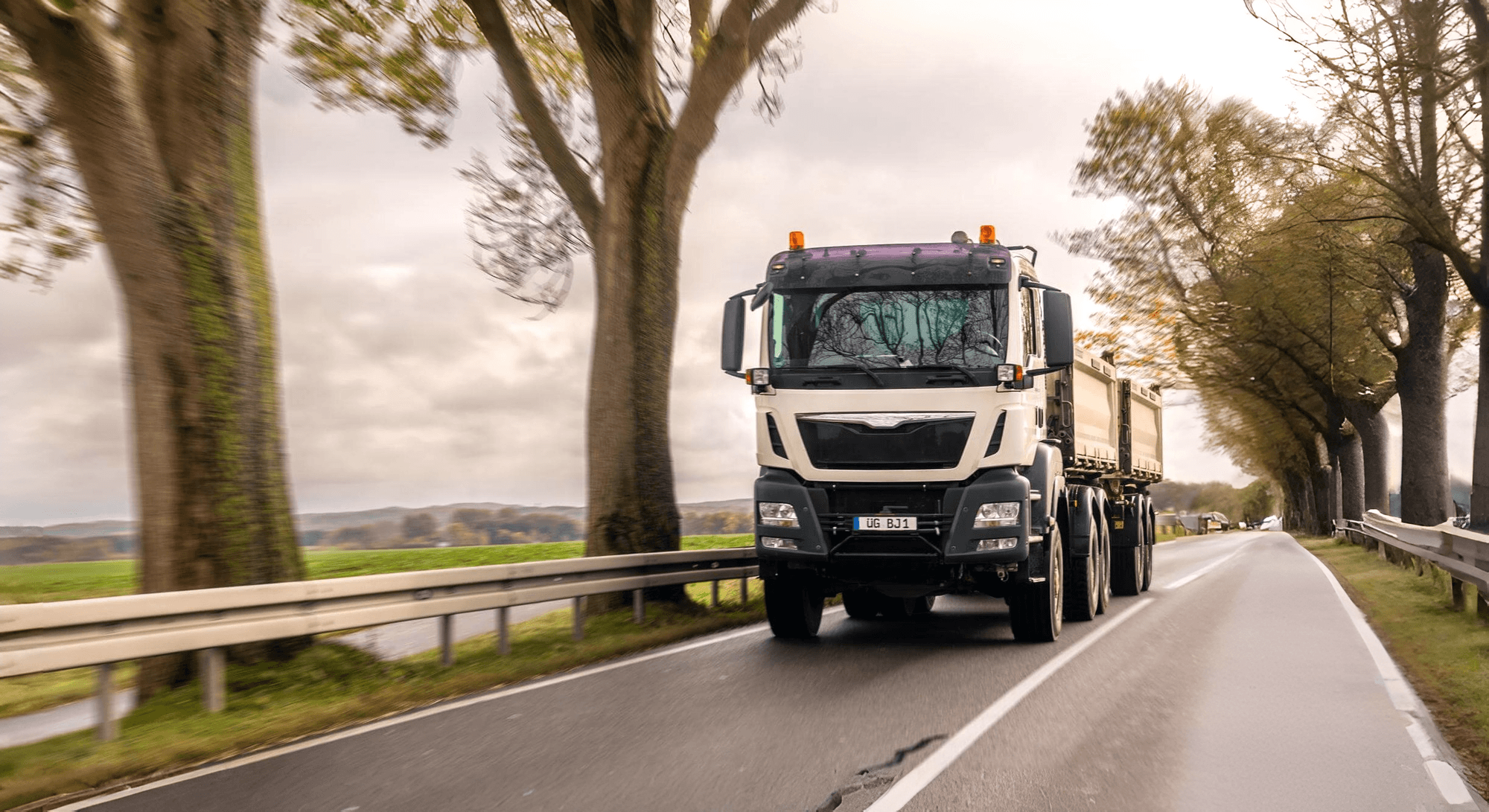 CDL driver and fleet manager reviewing a temp-to-hire trial period